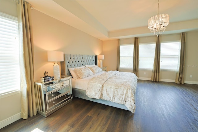 9257 Outlook Rock Trl, Windermere, FL 34786 - bedroom featuring dark wood-style floors, baseboards, and a chandelier