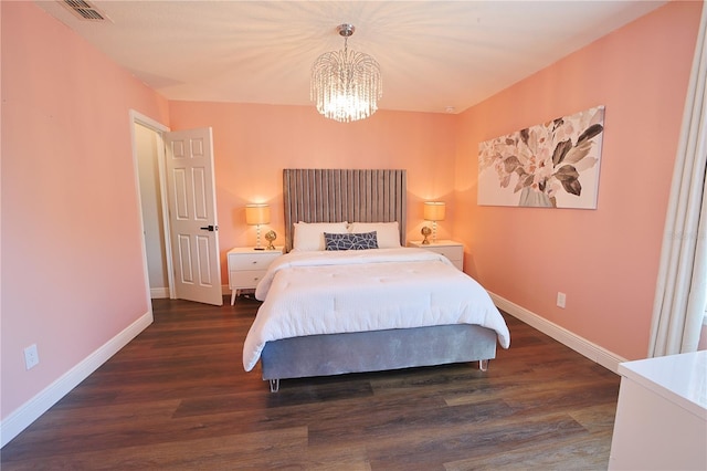 9257 Outlook Rock Trl, Windermere, FL 34786 - bedroom featuring a chandelier, wood finished floors, and baseboards