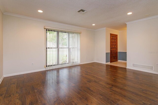 4739 Indian Gap Dr, Orlando, FL 32812 - spare room featuring wood finished floors, a textured ceiling, baseboards, recessed lighting, and crown molding