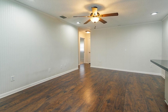 4739 Indian Gap Dr, Orlando, FL 32812 - unfurnished room featuring crown molding, a ceiling fan, dark wood-style flooring, a textured ceiling, and baseboards