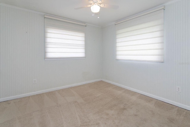 4739 Indian Gap Dr, Orlando, FL 32812 - unfurnished room featuring ornamental molding, a ceiling fan, carpet floors, and plenty of natural light