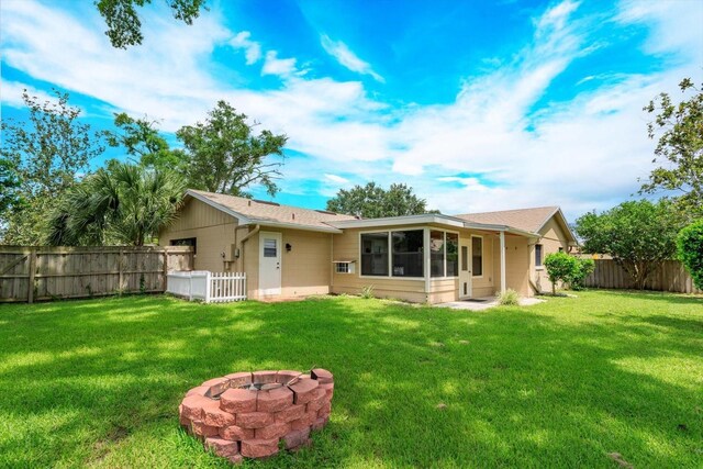 4739 Indian Gap Dr, Orlando, FL 32812 - rear view of property featuring a fire pit