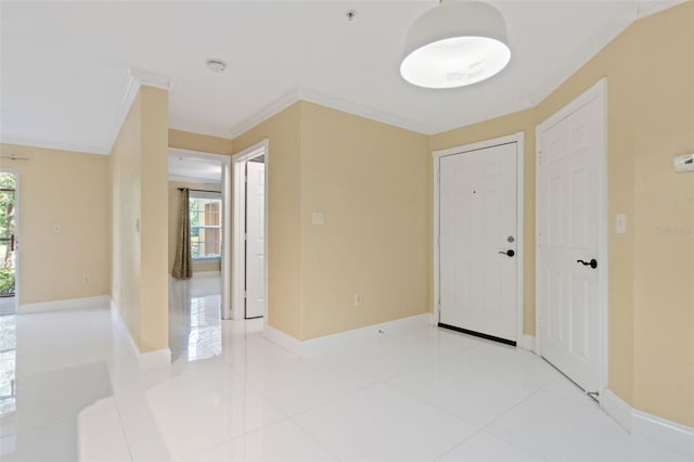5467 Vineland Rd Unit 6110, Orlando, FL 32811 - spare room with a smoke detector, crown molding, a pendent fire sprinkler, and tile patterned flooring