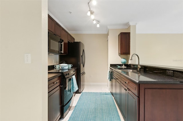 5467 Vineland Rd Unit 6110, Orlando, FL 32811 - kitchen with black microwave, range with electric cooktop, dark countertops, a peninsula, and ornamental molding