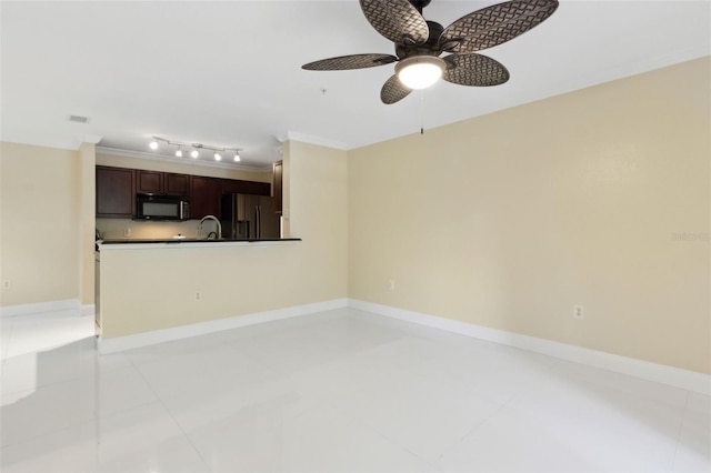 5467 Vineland Rd Unit 6110, Orlando, FL 32811 - unfurnished living room featuring ceiling fan, light tile patterned floors, and ornamental molding