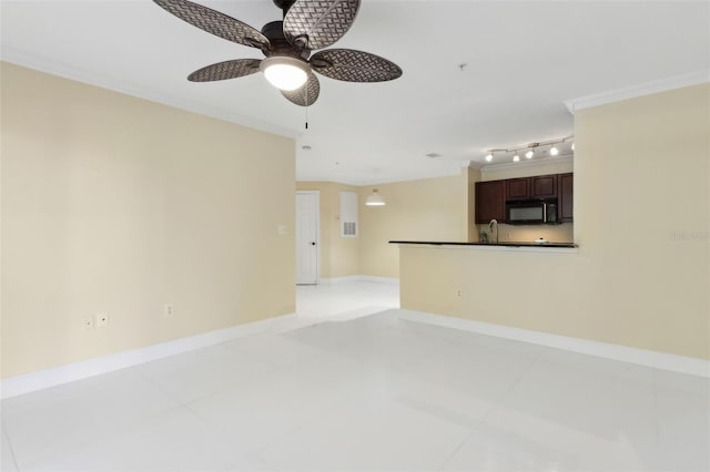 5467 Vineland Rd Unit 6110, Orlando, FL 32811 - unfurnished living room featuring crown molding, a ceiling fan, light tile patterned floors, and track lighting