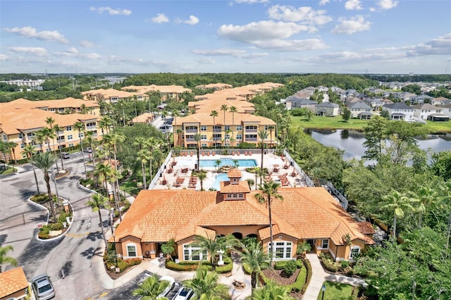 5467 Vineland Rd Unit 6110, Orlando, FL 32811 - aerial perspective of suburban area with a pool area and a nearby body of water