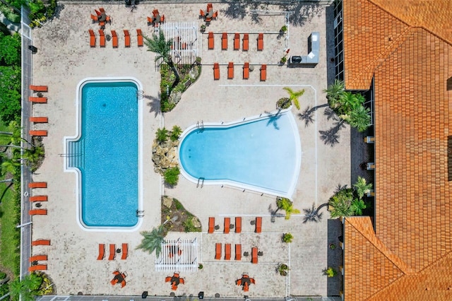 5467 Vineland Rd Unit 6110, Orlando, FL 32811 - bird's eye view of a pool area