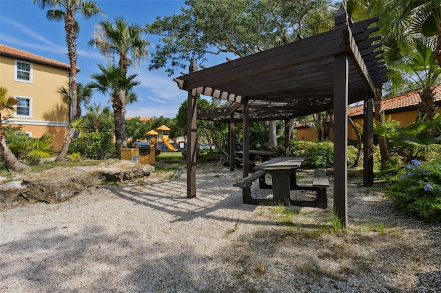 5467 Vineland Rd Unit 6110, Orlando, FL 32811 - view of patio / terrace featuring a pergola