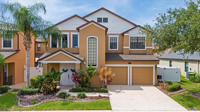 2753 Glenridge Cir, Merritt Island, FL 32953 - view of front of house featuring stucco siding, an attached garage, concrete driveway, and central AC unit