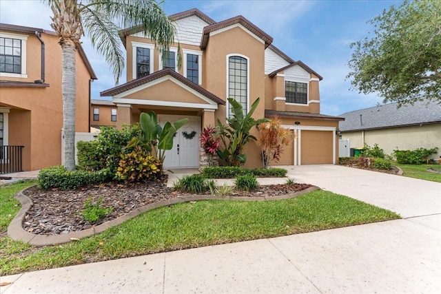 2753 Glenridge Cir, Merritt Island, FL 32953 - view of front of home with an attached garage, stucco siding, and concrete driveway