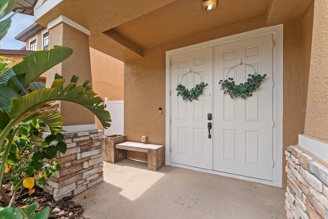 2753 Glenridge Cir, Merritt Island, FL 32953 - property entrance featuring stucco siding