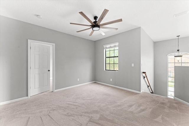 2753 Glenridge Cir, Merritt Island, FL 32953 - carpeted empty room with a ceiling fan and baseboards