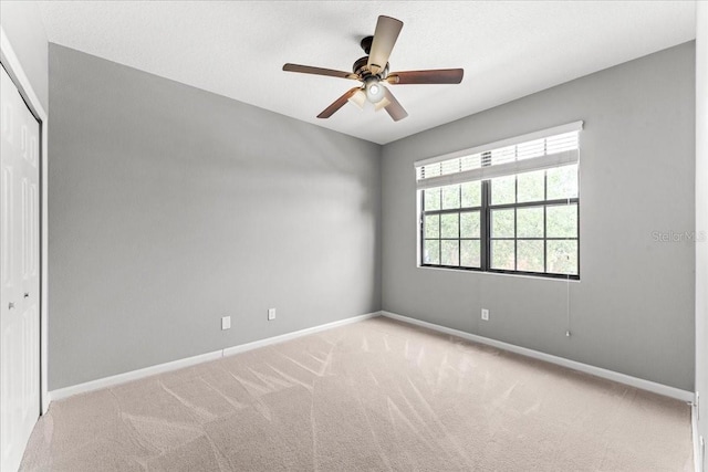 2753 Glenridge Cir, Merritt Island, FL 32953 - carpeted spare room with baseboards and ceiling fan