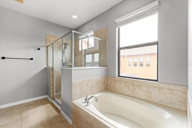 2753 Glenridge Cir, Merritt Island, FL 32953 - bathroom featuring a bath, a shower stall, and tile patterned floors