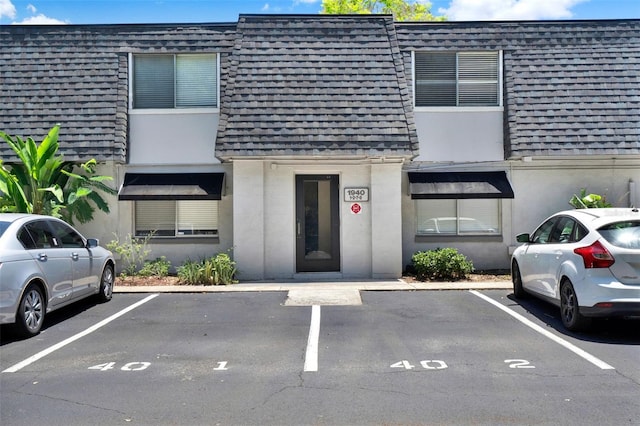 1940 S Conway Rd Unit 8, Orlando, FL 32812 - view of building exterior with uncovered parking