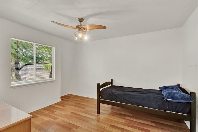 1940 S Conway Rd Unit 8, Orlando, FL 32812 - bedroom featuring light wood-style floors and a ceiling fan
