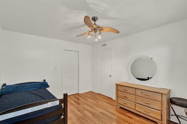 1940 S Conway Rd Unit 8, Orlando, FL 32812 - bedroom featuring light wood finished floors and a ceiling fan