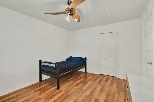 1940 S Conway Rd Unit 8, Orlando, FL 32812 - bedroom with light wood-style flooring and ceiling fan