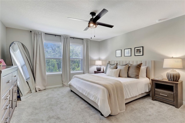 2335 Green Symphony Pl, Oviedo, FL 32765 - bedroom with light colored carpet, a ceiling fan, and a textured ceiling