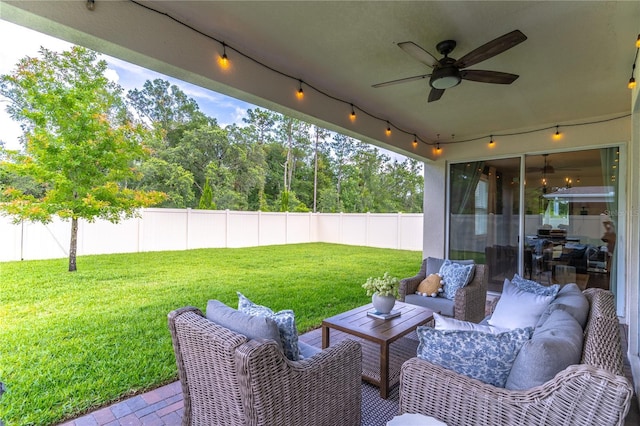 2335 Green Symphony Pl, Oviedo, FL 32765 - fenced backyard featuring a ceiling fan, outdoor lounge area, and a patio area