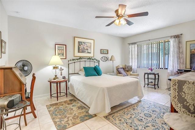 14 Escondido Ct Unit 134, Altamonte Springs, FL 32701 - bedroom with light tile patterned flooring and a ceiling fan