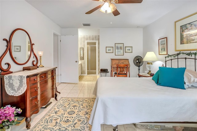 14 Escondido Ct Unit 134, Altamonte Springs, FL 32701 - bedroom with light tile patterned floors and a ceiling fan