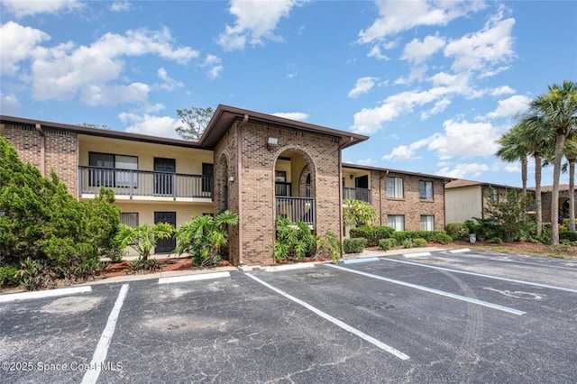 1515 Huntington Ln Unit 426, Rockledge, FL 32955 - view of building exterior featuring uncovered parking