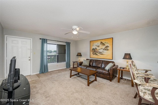 1515 Huntington Ln Unit 426, Rockledge, FL 32955 - living area with a ceiling fan, light colored carpet, and baseboards