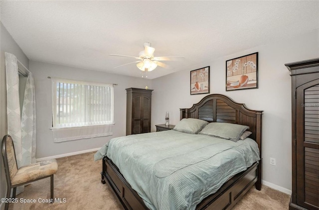 1515 Huntington Ln Unit 426, Rockledge, FL 32955 - bedroom with light colored carpet, baseboards, and a ceiling fan