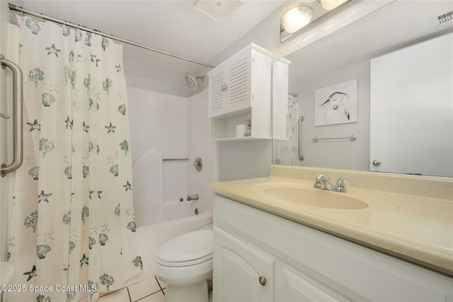 1515 Huntington Ln Unit 426, Rockledge, FL 32955 - full bath featuring vanity, toilet, shower / bath combination with curtain, and tile patterned floors