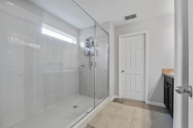 2620 Waterline St, Kissimmee, FL 34743 - full bathroom featuring a stall shower, vanity, tile patterned floors, and baseboards