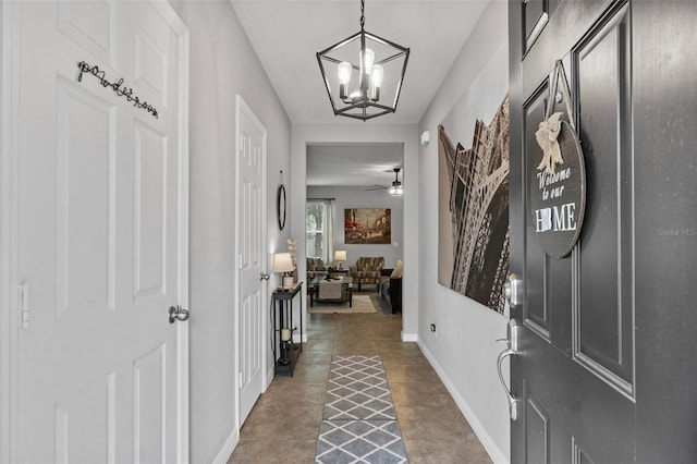 2620 Waterline St, Kissimmee, FL 34743 - foyer entrance with a chandelier and baseboards
