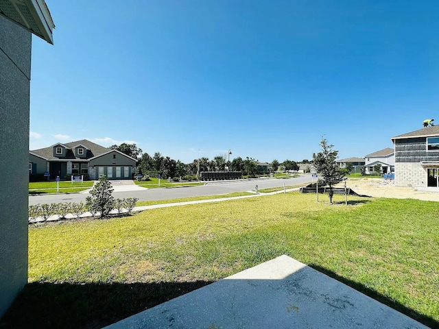 2807 Alder Berry Blvd, Ocoee, FL 34761 - view of green lawn with a residential view