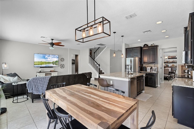 750 Maple Leaf Loop, Winter Springs, FL 32708 - dining room featuring light tile patterned floors, a ceiling fan, stairway, and recessed lighting