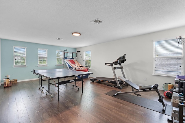 750 Maple Leaf Loop, Winter Springs, FL 32708 - recreation room featuring dark wood-style floors, baseboards, and a textured ceiling