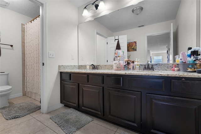 750 Maple Leaf Loop, Winter Springs, FL 32708 - bathroom featuring toilet, double vanity, tile patterned flooring, and a shower with shower curtain