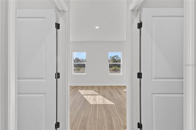 16730 SW 50th Cir, Ocala, FL 34473 - corridor with wood finished floors, recessed lighting, and baseboards