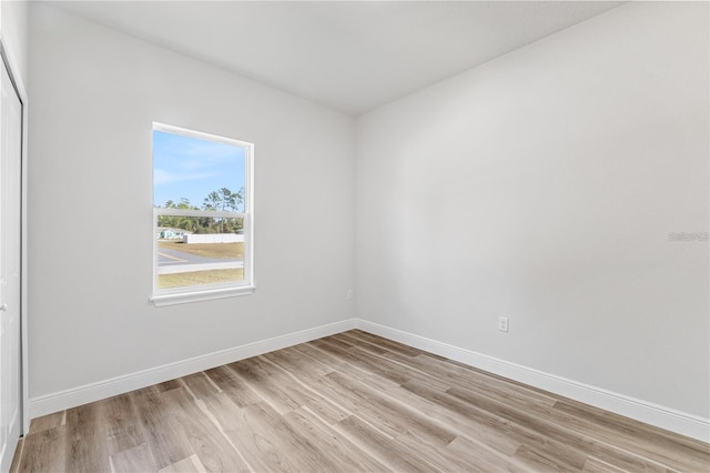 16730 SW 50th Cir, Ocala, FL 34473 - unfurnished room with light wood finished floors and baseboards