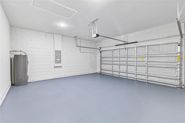 16730 SW 50th Cir, Ocala, FL 34473 - garage with water heater, electric panel, a garage door opener, and concrete block wall