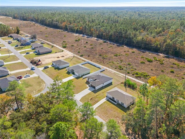 16730 SW 50th Cir, Ocala, FL 34473 - aerial perspective of suburban area with a heavily wooded area