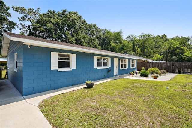 6663 NW 60th St, Ocala, FL 34482 - ranch-style home with concrete block siding