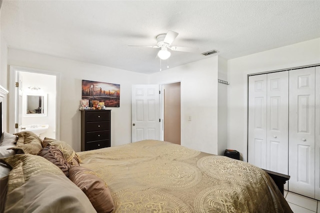 6663 NW 60th St, Ocala, FL 34482 - bedroom featuring a closet, ceiling fan, and connected bathroom