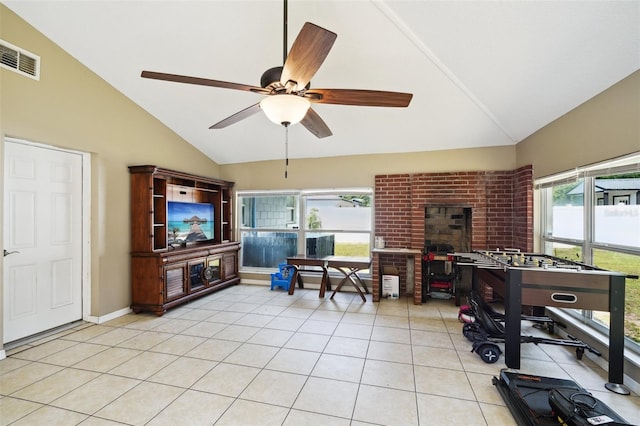 6663 NW 60th St, Ocala, FL 34482 - living room with light tile patterned floors, a ceiling fan, and high vaulted ceiling