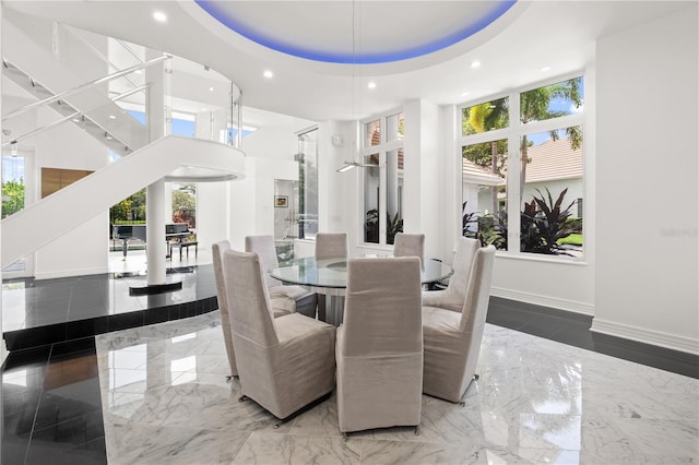 9138 Great Heron Cir, Orlando, FL 32836 - dining space with recessed lighting, a high ceiling, and marble tiled floors