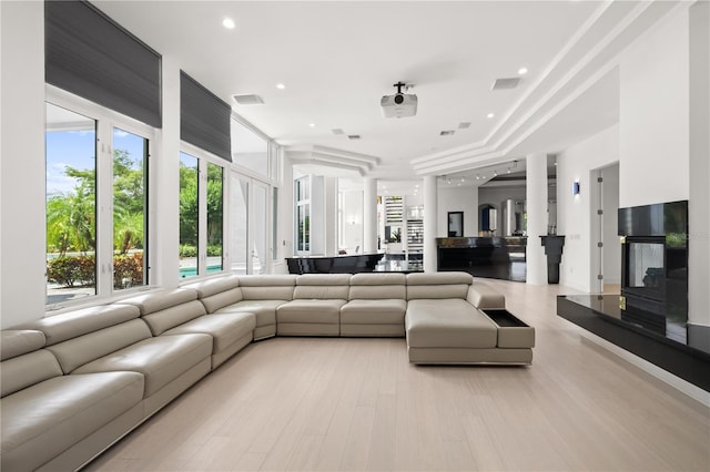 9138 Great Heron Cir, Orlando, FL 32836 - living room featuring light wood-type flooring and recessed lighting