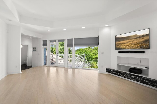 9138 Great Heron Cir, Orlando, FL 32836 - unfurnished living room featuring recessed lighting and wood finished floors