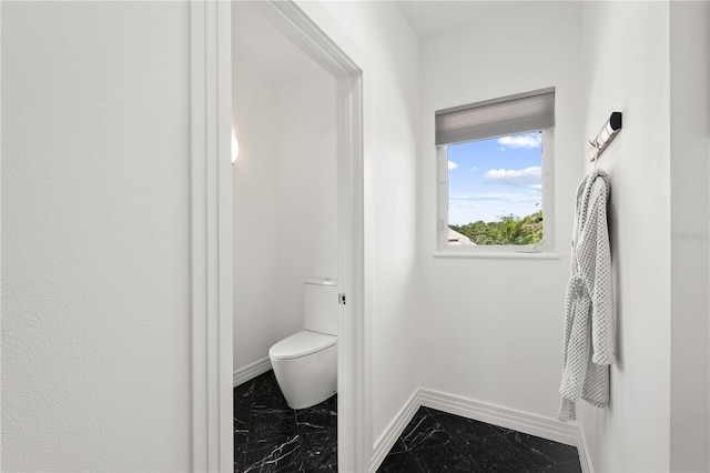 9138 Great Heron Cir, Orlando, FL 32836 - bathroom featuring toilet and baseboards