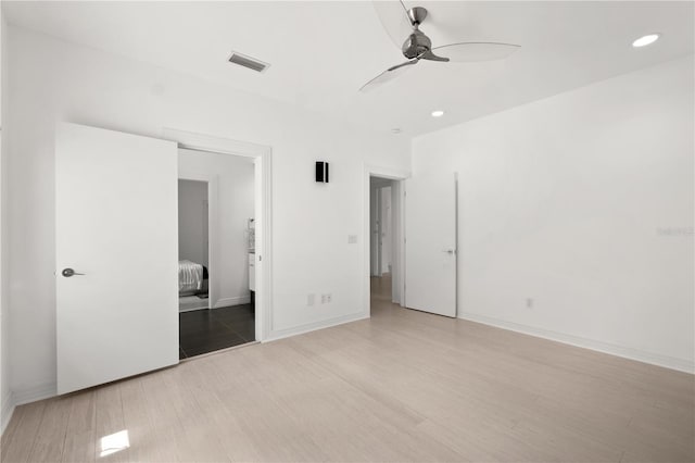 9138 Great Heron Cir, Orlando, FL 32836 - unfurnished bedroom featuring light wood-style floors, recessed lighting, and ceiling fan