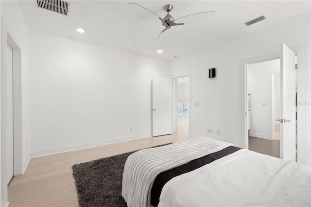 9138 Great Heron Cir, Orlando, FL 32836 - bedroom with light wood-style floors, recessed lighting, and a ceiling fan